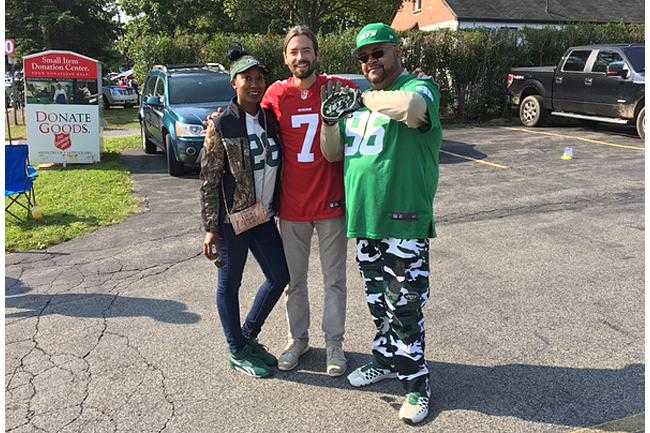 Rohan with Jets fans outside Ralph Wilson Stadium.
